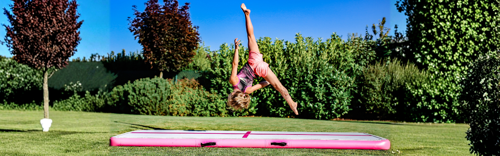 Gymnastka trénující salto na Airtracku MASTER